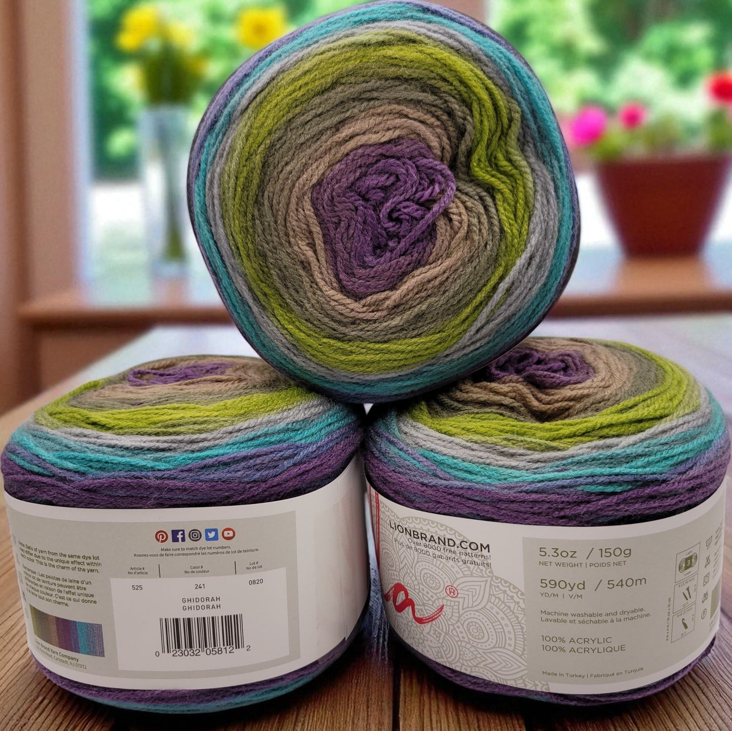 Mandala yarn in Ghidorah — multicolored self-striping acrylic, 590-yard skein