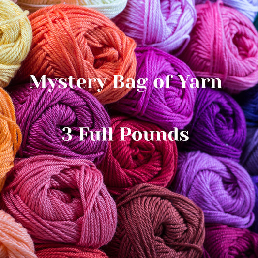 Mystery Bag of Yarn with 3 full pounds of premium yarn in vibrant purple, pink, coral, and orange colorways